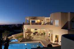 Custom hand-forged wrought iron ¾-inch picket railing surrounds the open-air bal Custom hand-forged wrought iron ¾-inch picket railing surrounds the open-air bal