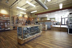 A new steel beam installed in the existing CMU wall between sales areas provided A new steel beam installed in the existing CMU wall between sales areas provided