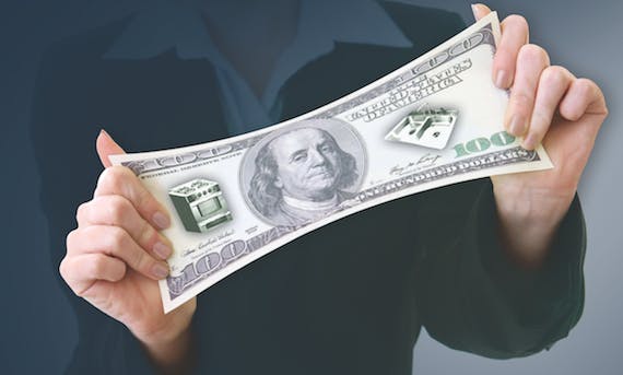 Image of a $100 bill being stretched