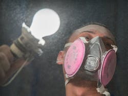Worker with dust in the air on a jobsite. Photo: courtesy ITW Worker with dust in the air on a jobsite. Photo: courtesy ITW