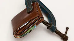 Wallet squeezed in a C-clamp