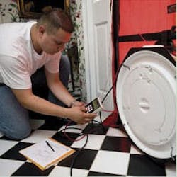 Testing the airtightness of a home using a special fan called a blower door. Testing the airtightness of a home using a special fan called a blower door.