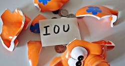 Unpaid invoices and IOU in piggy bank Unpaid invoices and IOU in piggy bank