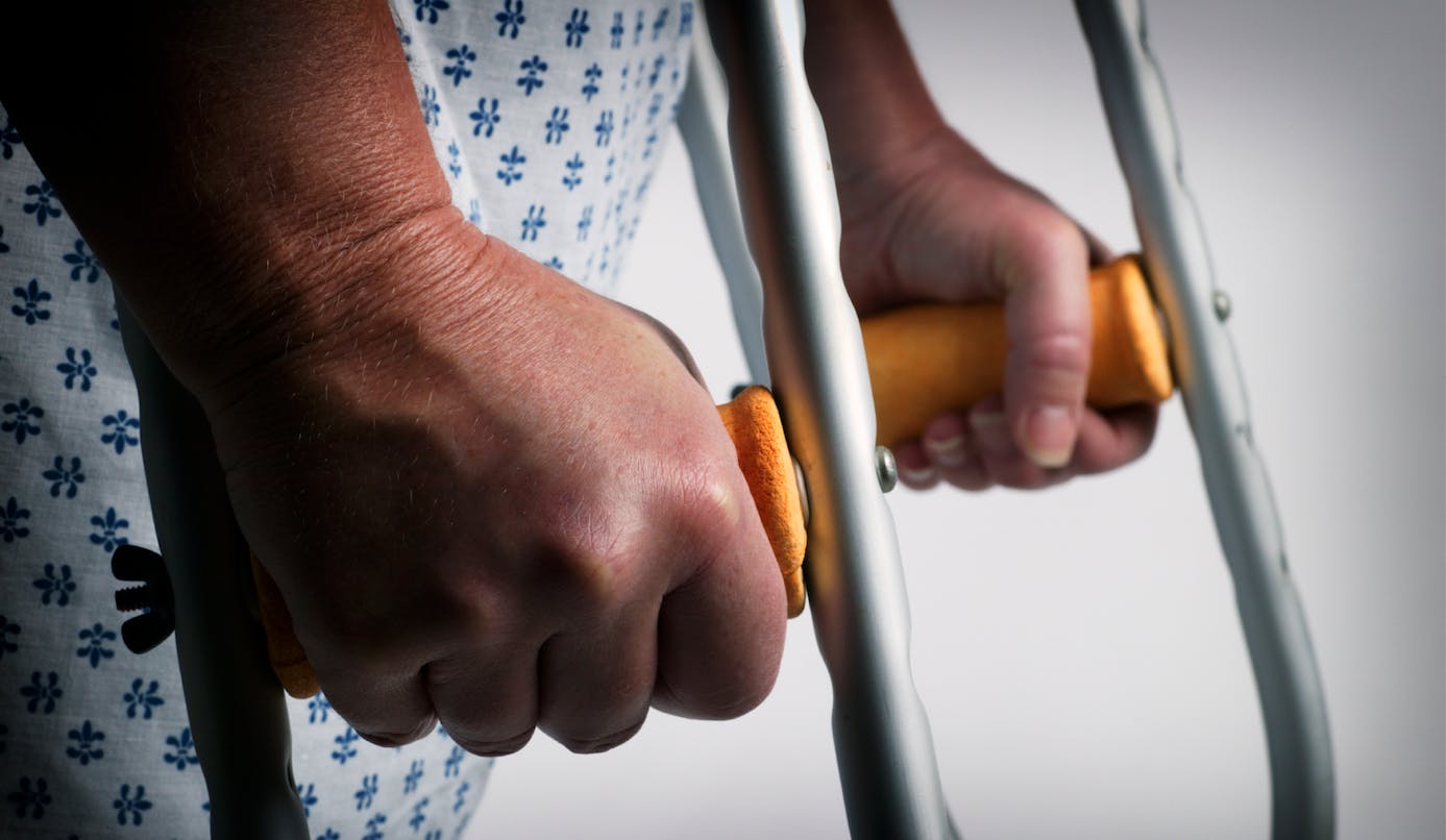workers' compensation worker on crutches