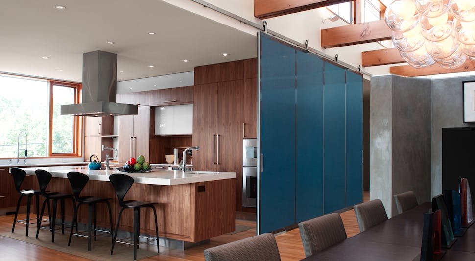 Barn doors can be used to divide large, open spaces. Farmhouse sliding door Photo: courtesy Baldur by Krown Lab