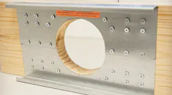 These metal plates restore strength to joists that have encountered an overzealous plumber