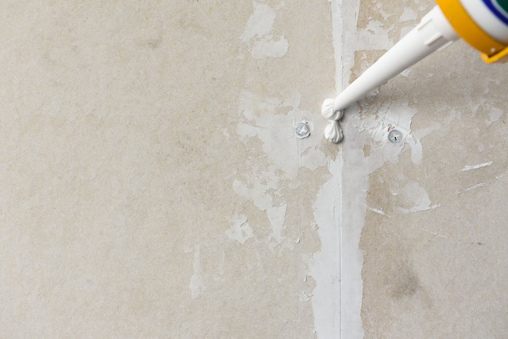 caulking can be a messy job for remodelers