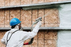 contractor applies insulation to home contractor applies insulation to home