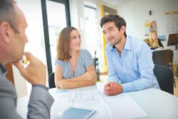 remodeler telling his client a story remodeler telling his client a story