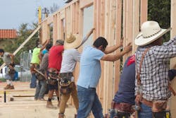 Team framing a home Team framing a home