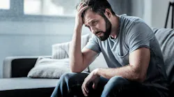 Stressed out man on couch