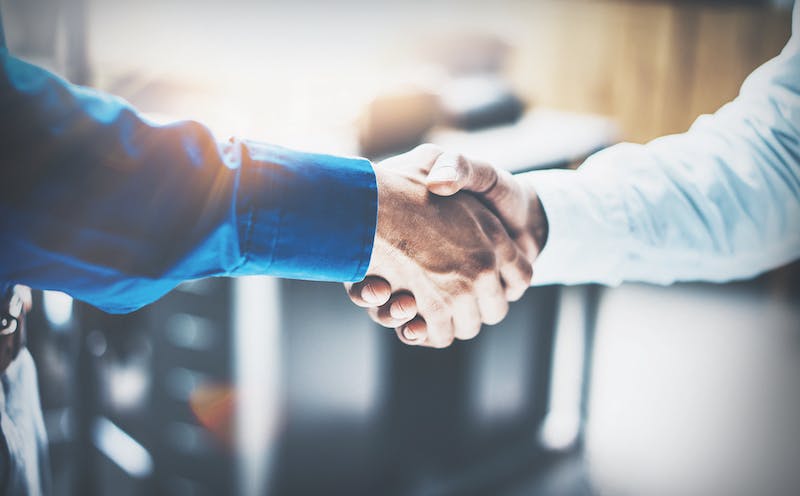 handshake between two men