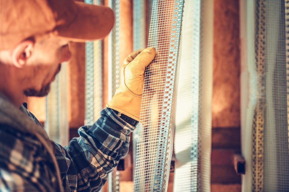 Contractor Picking out Drywall