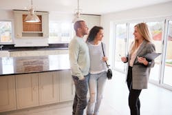 realtor suggesting remodeling services to new buyers and sellers realtor suggesting remodeling services to new buyers and sellers