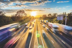 cars using a highway cars using a highway