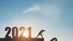 man pushing 2020 off a ledge