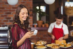 Client Holding Cell Phone Client Holding Cell Phone