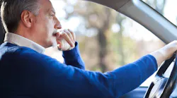Remodeling sales rep in car