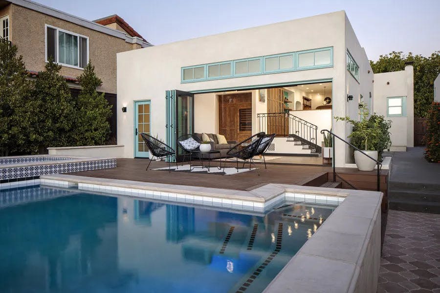 Home that utilizes Andersen Folding Outswing doors to expand indoor / outdoor living