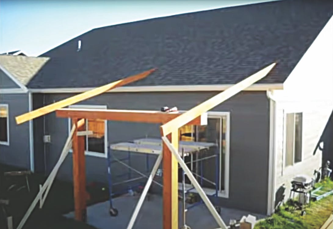How to Attach a Patio Roof to an Existing House | Pro Remodeler