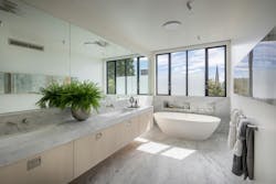 Master bathroom with large mirror Master bathroom with large mirror