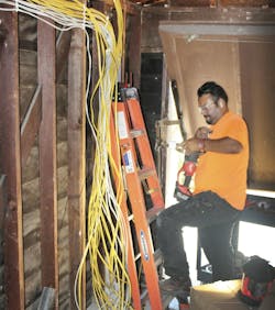 Remodeler Working With Wiring%20copy Remodeler Working With Wiring%20copy