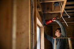 Young tradesperson remodeling home: Adobe Stock Young tradesperson remodeling home: Adobe Stock