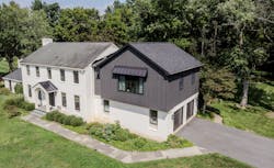 Cornerstone Remodeling added a large primary suite over their client's existing garage. The big challenge was designing the exterior so it kept the original home's charm and curb appeal. Photo: Cornerstone Remodeling. Cornerstone Remodeling added a large primary suite over their client's existing garage. The big challenge was designing the exterior so it kept the original home's charm and curb appeal. Photo: Cornerstone Remodeling.