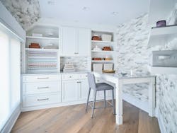 One of designer Anne van de Rijn’s many superpowers is her ability to “get a little bit nosy.” That may mean looking in clients’ cabinets to learn how they use storage or peeking inside closets. In this case, the trait paid off when she suggested turning unused space into a luxurious gift-wrapping room for the wife, thus addressing an unmet need. One of designer Anne van de Rijn’s many superpowers is her ability to “get a little bit nosy.” That may mean looking in clients’ cabinets to learn how they use storage or peeking inside closets. In this case, the trait paid off when she suggested turning unused space into a luxurious gift-wrapping room for the wife, thus addressing an unmet need.