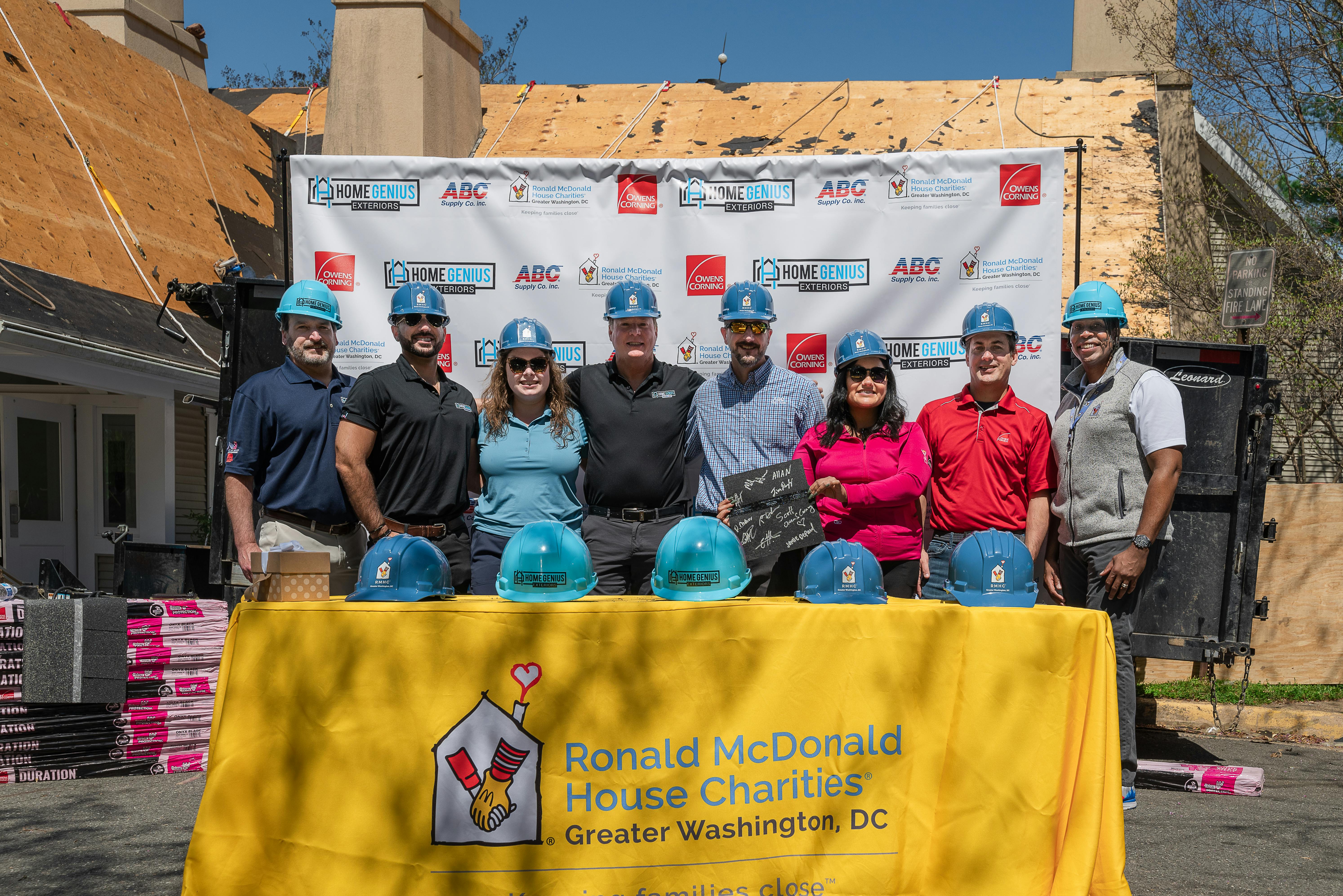 Home Genius Cares volunteers at Ronald McDonald House of Northern Virginia. The company donated a new roof and gutters to the project.