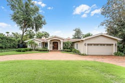 This formerly nondescript ranch (above) was transformed into something special with a new sophisticated tropical Miami aesthetic (top). In keeping with the “soft remodel” ethos, rooftiles were reused, the circular driveway remained intact, and the existing front entry door was simply refinished. This formerly nondescript ranch (above) was transformed into something special with a new sophisticated tropical Miami aesthetic (top). In keeping with the “soft remodel” ethos, rooftiles were reused, the circular driveway remained intact, and the existing front entry door was simply refinished.
