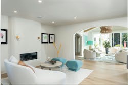 Where’s the backyard? Before the remodel (below) the view from the entry was not of lush grounds, but rather the back wall of a family room (formerly a porch) with narrow windows and a low sloped ceiling. Now, large windows and a vaulted ceiling (above) frame the view to the outside. Where’s the backyard? Before the remodel (below) the view from the entry was not of lush grounds, but rather the back wall of a family room (formerly a porch) with narrow windows and a low sloped ceiling. Now, large windows and a vaulted ceiling (above) frame the view to the outside.