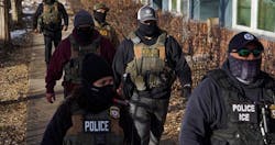 U.S. Immigration and Customs Enforcement (ICE) agents walk during an immigration raid Jan. 13 in Minneapolis. As a result of the raids, increasing numbers of migrant tradespeople, including those with work permits, are afraid to show up for work, which is affecting project timelines. (Photo: REUTERS/Ryan Murphy) U.S. Immigration and Customs Enforcement (ICE) agents walk during an immigration raid Jan. 13 in Minneapolis. As a result of the raids, increasing numbers of migrant tradespeople, including those with work permits, are afraid to show up for work, which is affecting project timelines. (Photo: REUTERS/Ryan Murphy)