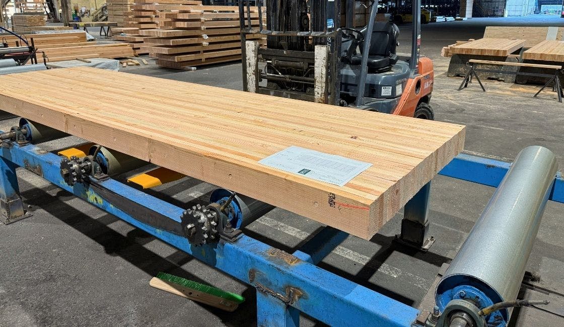 A dowel-laminated timber floor panel. Made from 'trash trees,' and using dowels instead of (a lot of) adhesives, the panels can help cut carbon and reduce wildfire.