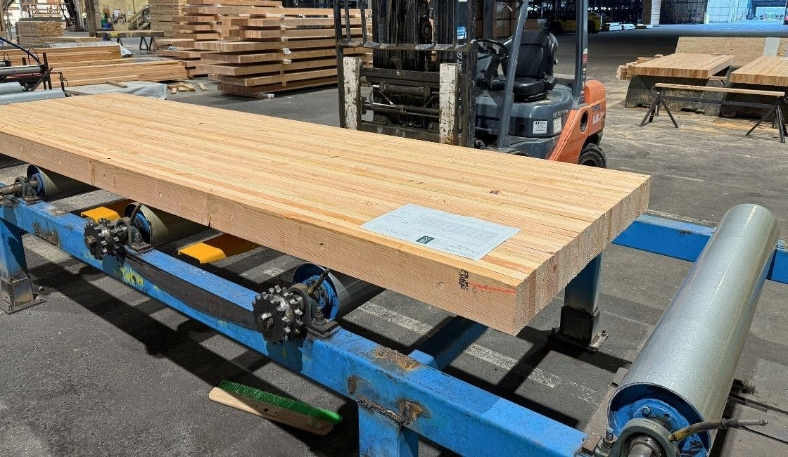 A dowel-laminated timber floor panel. Made from 'trash trees,' and using dowels instead of (a lot of) adhesives, the panels can help cut carbon and reduce wildfire.
