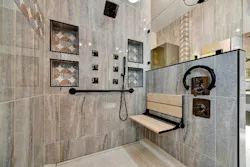 3) The various grab bars and safety features built into the shower were worked into the design from the early stages, contributing to the overall vision.