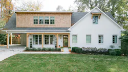 The original home (below) was small, dated, and dark. Now, it’s more than double in size and height (above) and its brick is painted Egret White with cedar shakes, beams, and brackets adding contrast and warmth. The front elevation wall is the only element that was retained during the rebuild, partly for nostalgia and partly for cost savings.