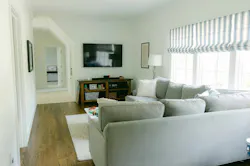 Adding a second floor more than doubled the size of the home, and this family playroom room (K on the floor plan) is a central element upstairs.